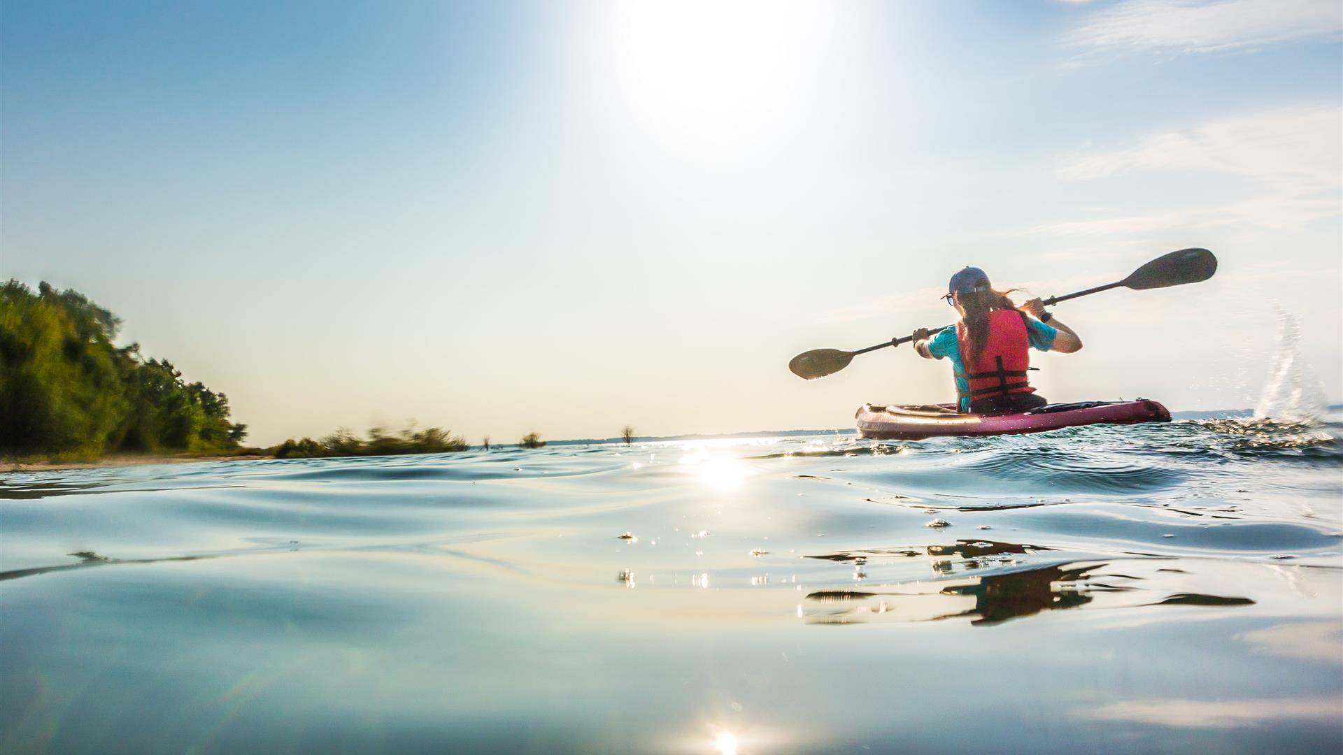 a person kayaking in Northern Michigan