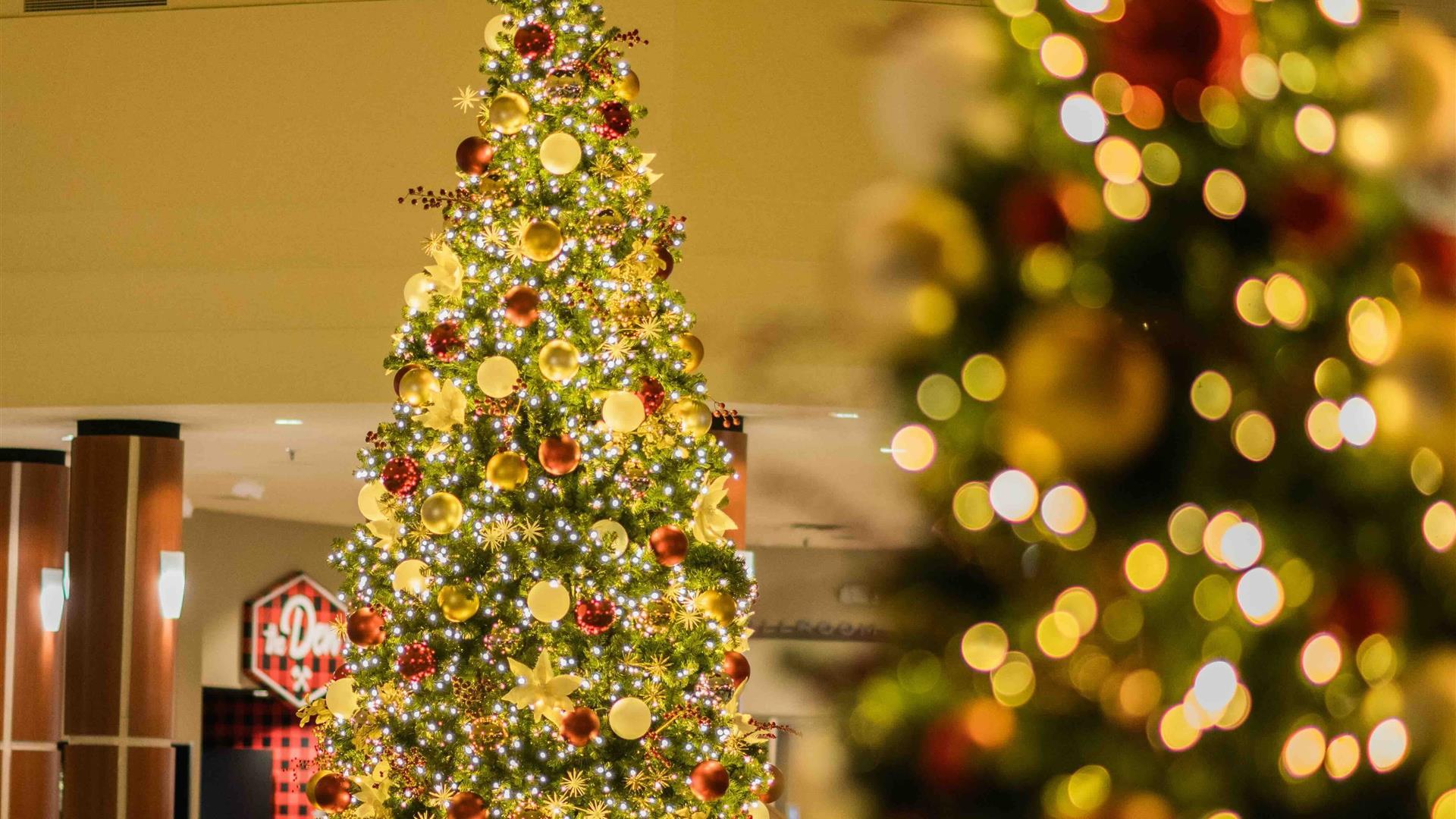 Decorated Christmas tree in the Grand Traverse Resort and Spa lobby during the holiday season.
