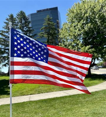 American Flag in front of the Tower